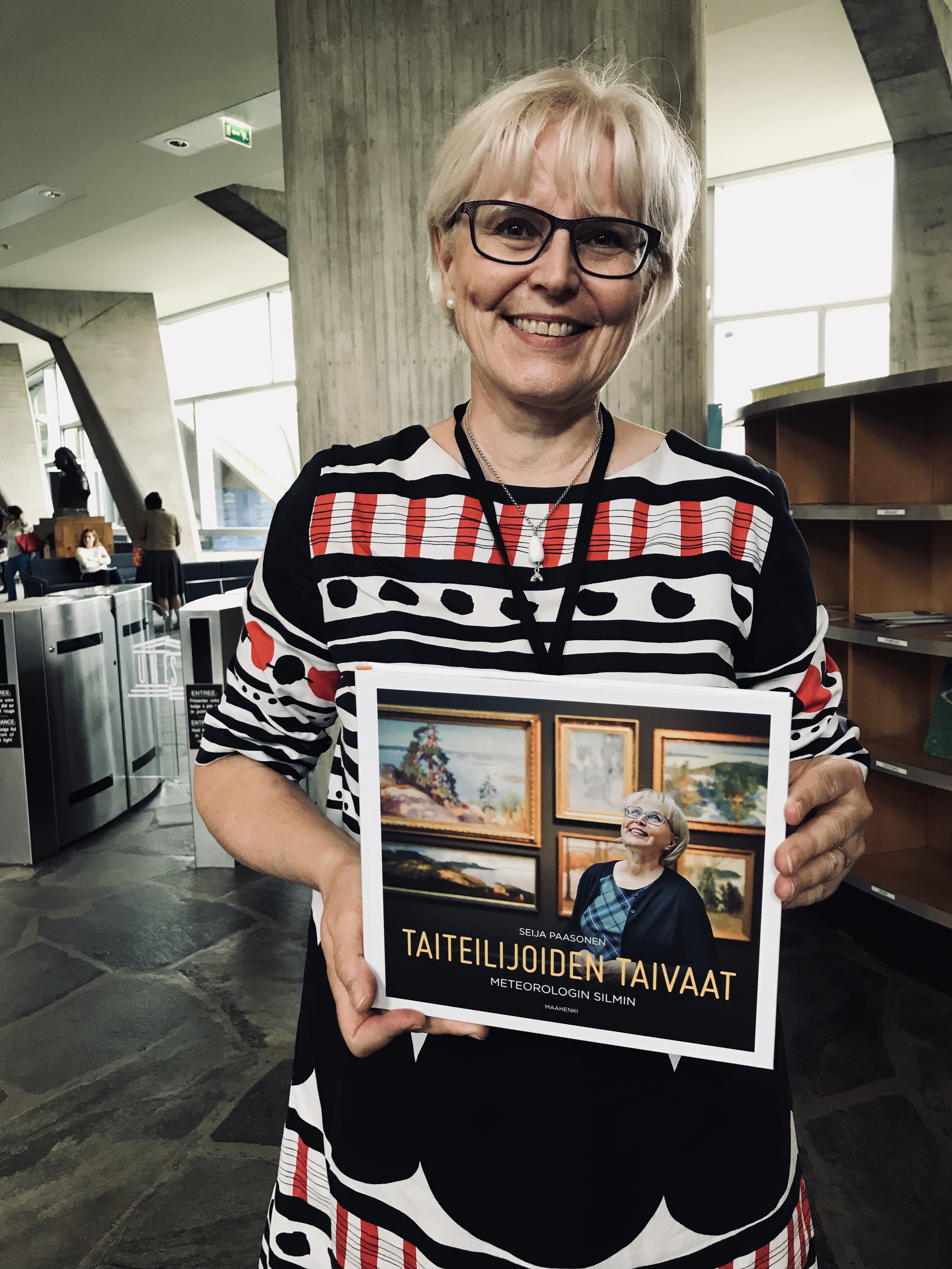 Seija Paasonen from Finland holding her new book